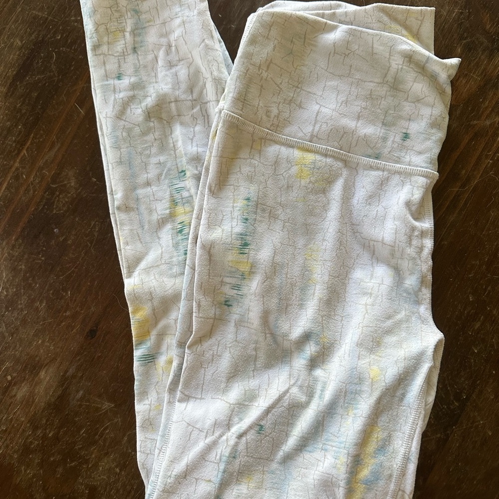 Fabletics Women’s Powerhold Cream Leggings with Green and Yellow Accents
